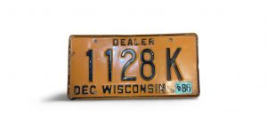1986 WISCONSIN DEALER LICENSE PLATE 1128 K