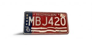 1976 MICHIGAN LICENSE PLATE MBJ 420 STCKERED