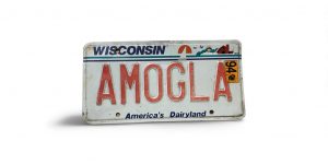 1994 WISCONSIN LICENSE PLATE VANITY ALGOMA SPELLED BACKWARDS
